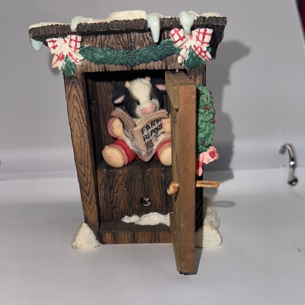 Festive Cow Figurine in Wooden Outhouse
